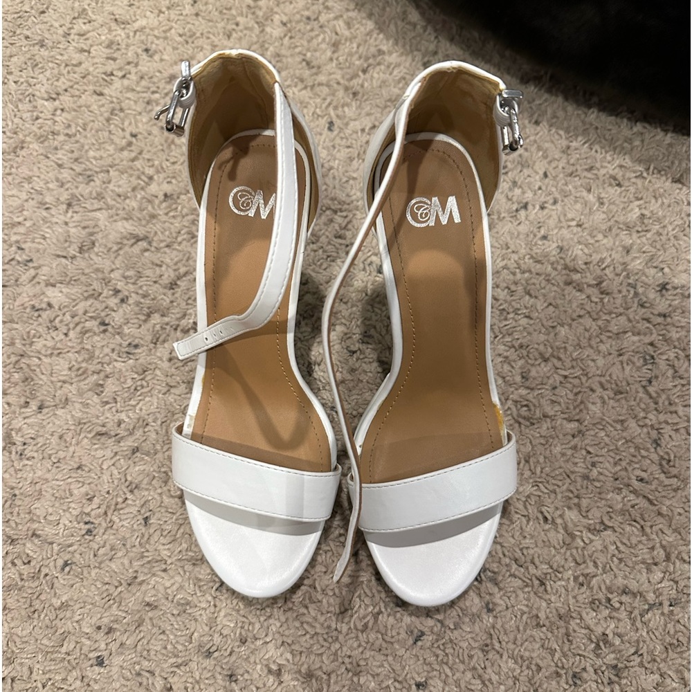 Plain white heels, rarely worn, size 7